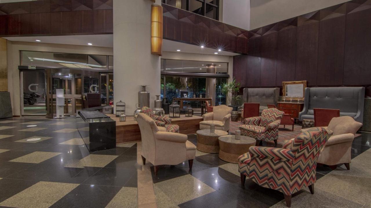 Hotel Deville Prime פורטו אלגרה מראה חיצוני תמונה Lobby