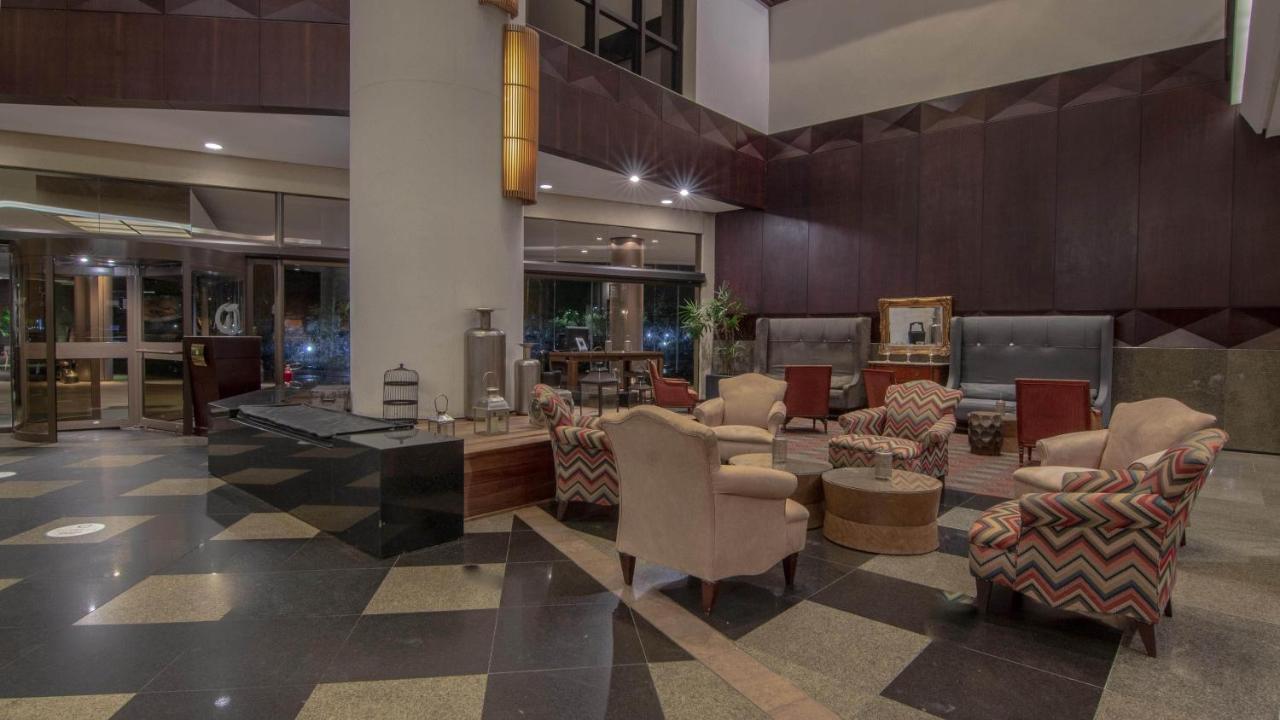 Hotel Deville Prime פורטו אלגרה מראה חיצוני תמונה The lobby of the hotel