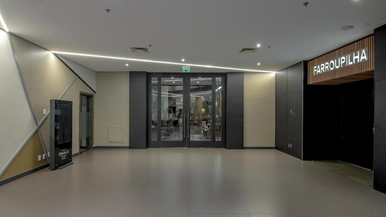 Hotel Deville Prime פורטו אלגרה מראה חיצוני תמונה Entrance to the Farrouk Lounge